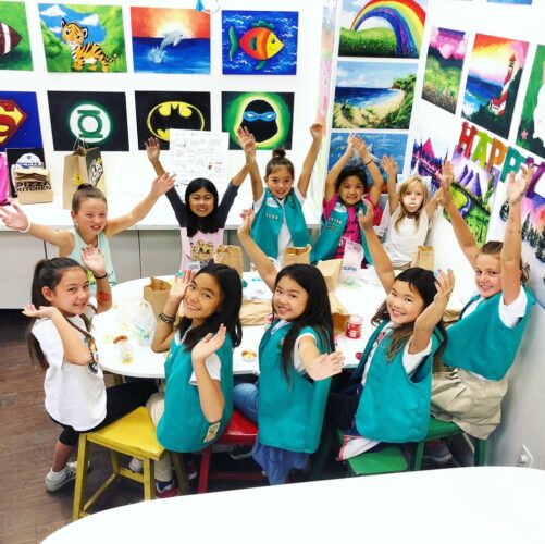 group of students doing artwork