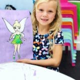 young artist with fairy painting