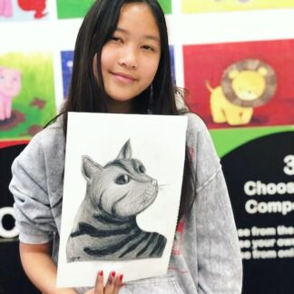 art student with sketch of cat