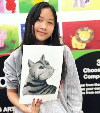 art student with sketch of cat