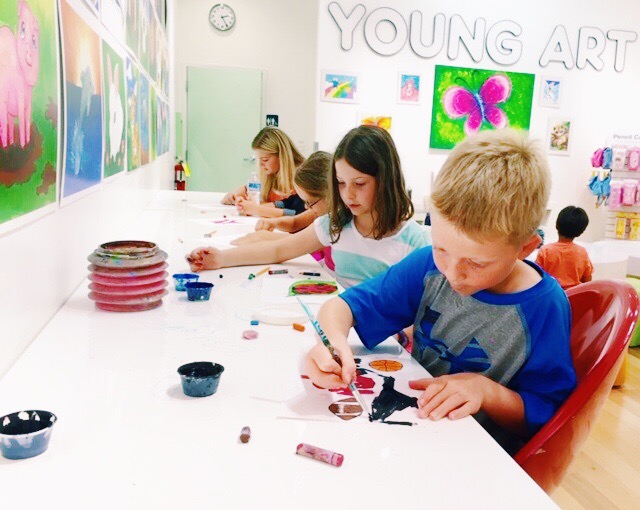 image of students making art in studio