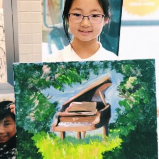 student with canvas artwork