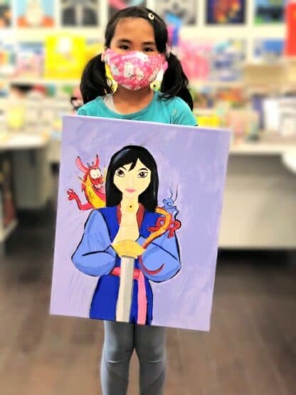 girl holding painting of Mulan on canvas