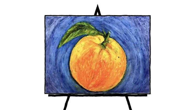 image of orange with green leaf and blue background