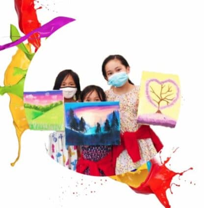 three girls showing finished artwork