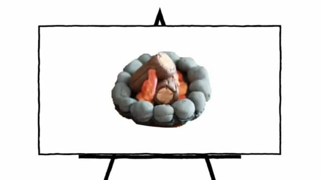 3d sculpture of camp fire with clay in grey rocks and orange fire with brown logs