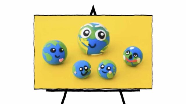 image of five clay sculpted 3d rounded shapes with green and blue and faces